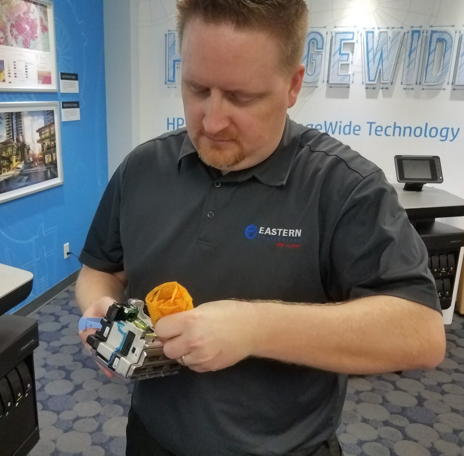 Service Tech working on Printer Repair